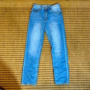 blue jeans size 25 with a light washed color